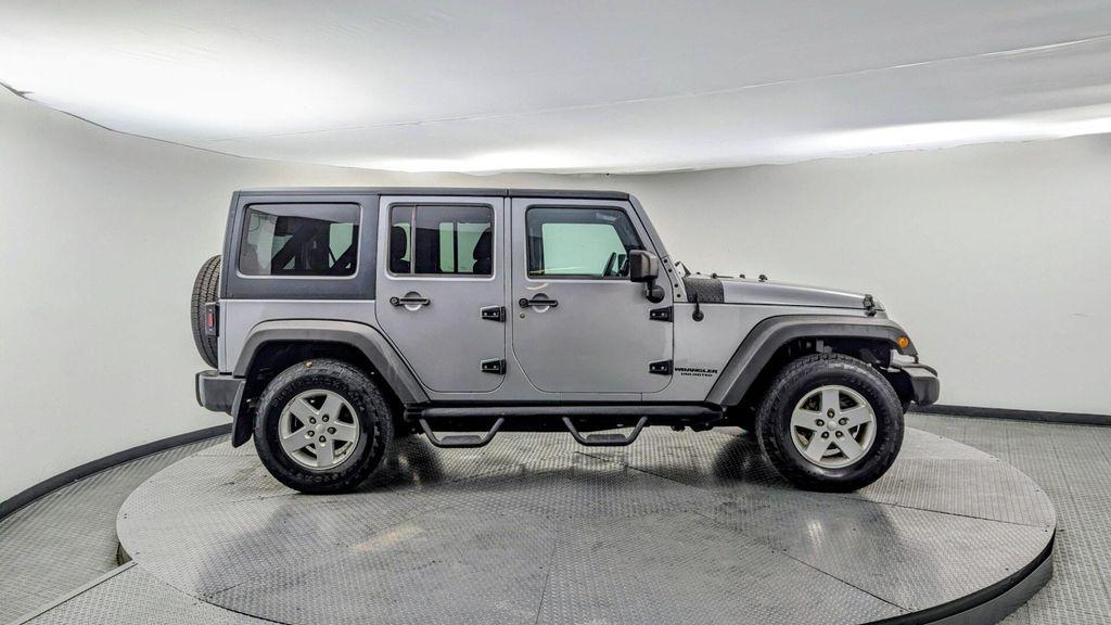 used 2015 Jeep Wrangler Unlimited car, priced at $9,499