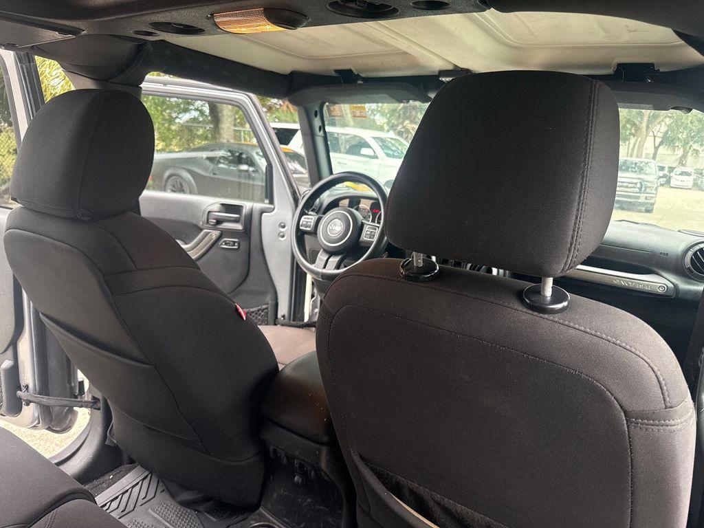 used 2015 Jeep Wrangler Unlimited car, priced at $9,999