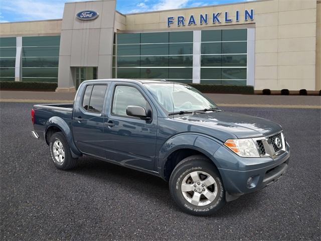 used 2013 Nissan Frontier car, priced at $14,000