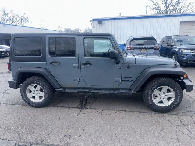 used 2015 Jeep Wrangler Unlimited car, priced at $15,888