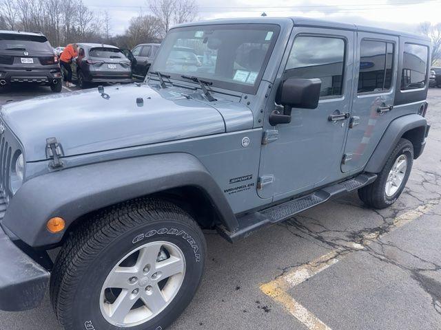used 2015 Jeep Wrangler Unlimited car, priced at $15,888