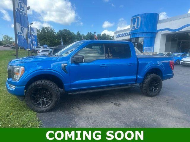 used 2021 Ford F-150 car, priced at $34,430