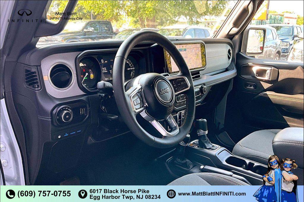 used 2024 Jeep Wrangler 4xe car, priced at $33,187