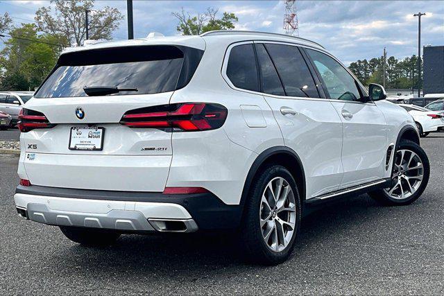 used 2026 BMW X5 car, priced at $62,418