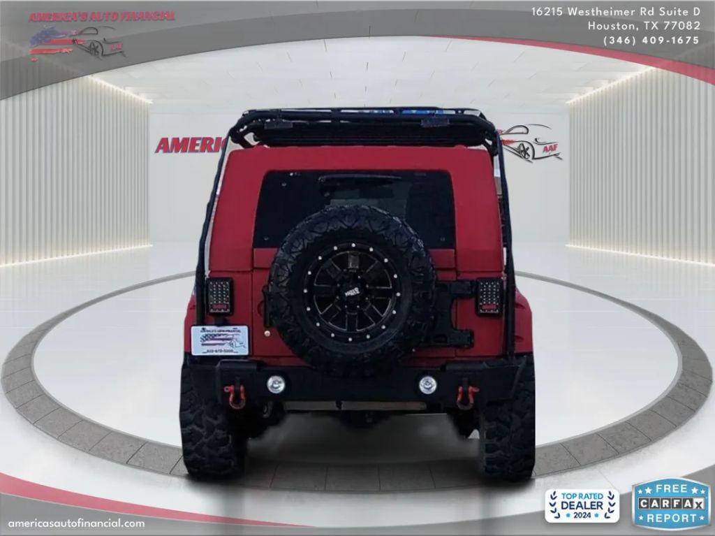 used 2013 Jeep Wrangler Unlimited car, priced at $21,995