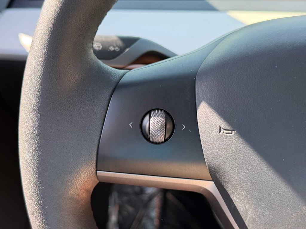 used 2023 Tesla Model 3 car, priced at $27,699