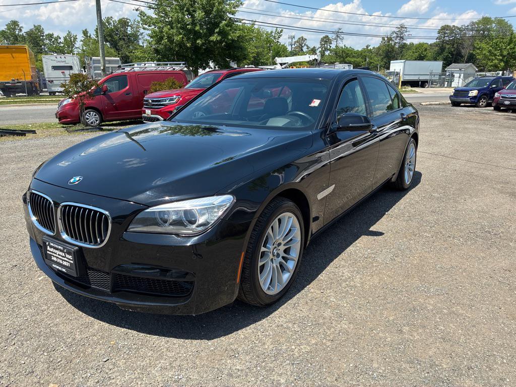 used 2015 BMW 740 car, priced at $15,795
