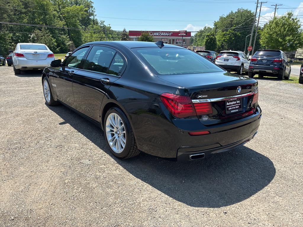 used 2015 BMW 740 car, priced at $15,795