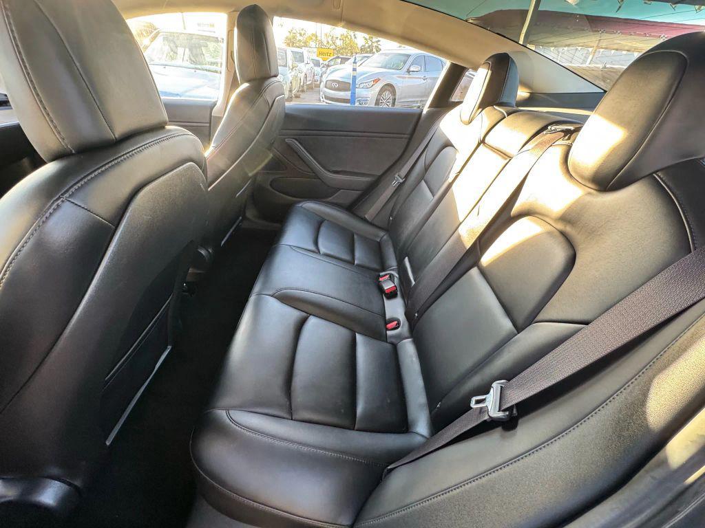 used 2018 Tesla Model 3 car, priced at $15,000