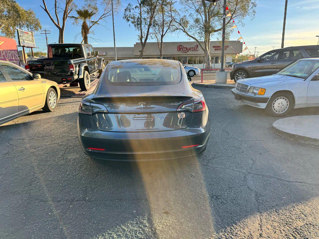 used 2018 Tesla Model 3 car, priced at $15,000