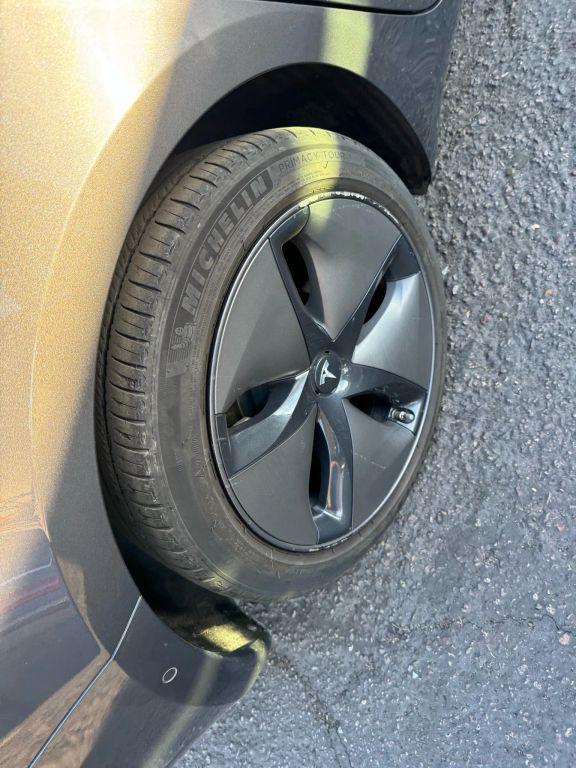 used 2018 Tesla Model 3 car, priced at $15,000