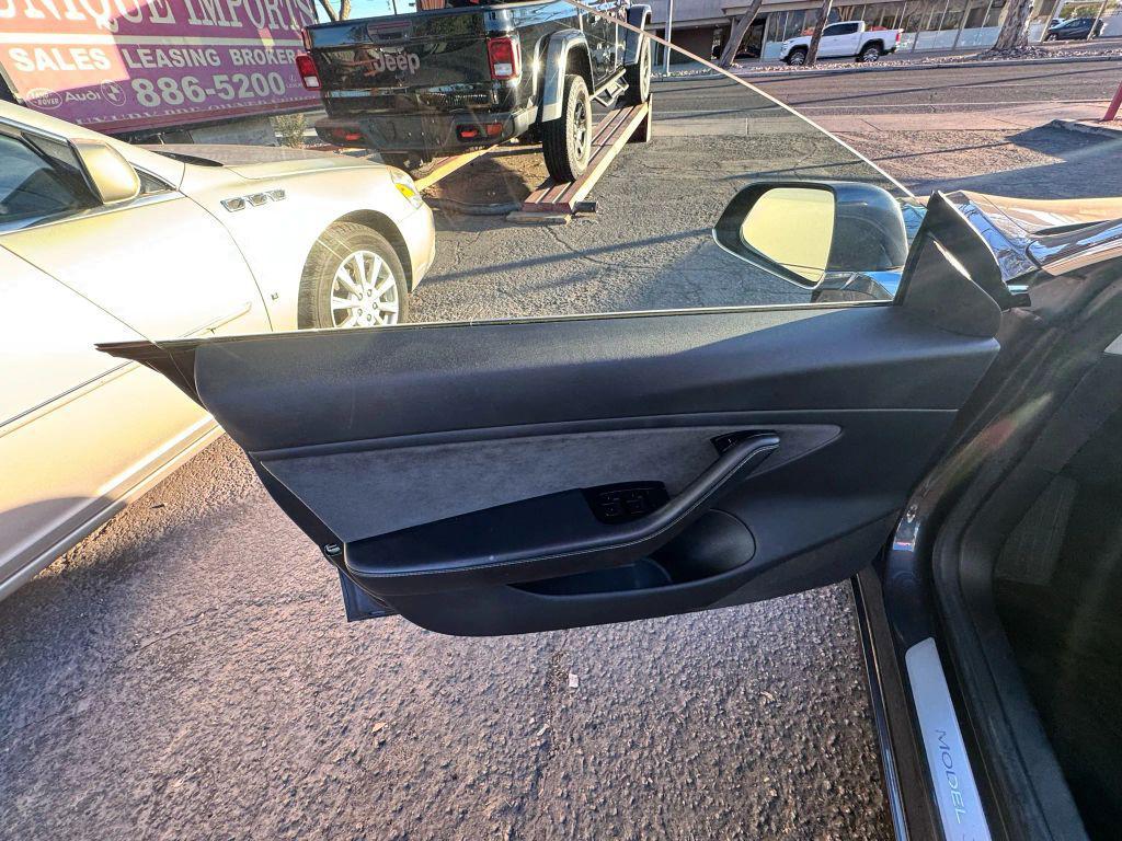 used 2018 Tesla Model 3 car, priced at $15,000