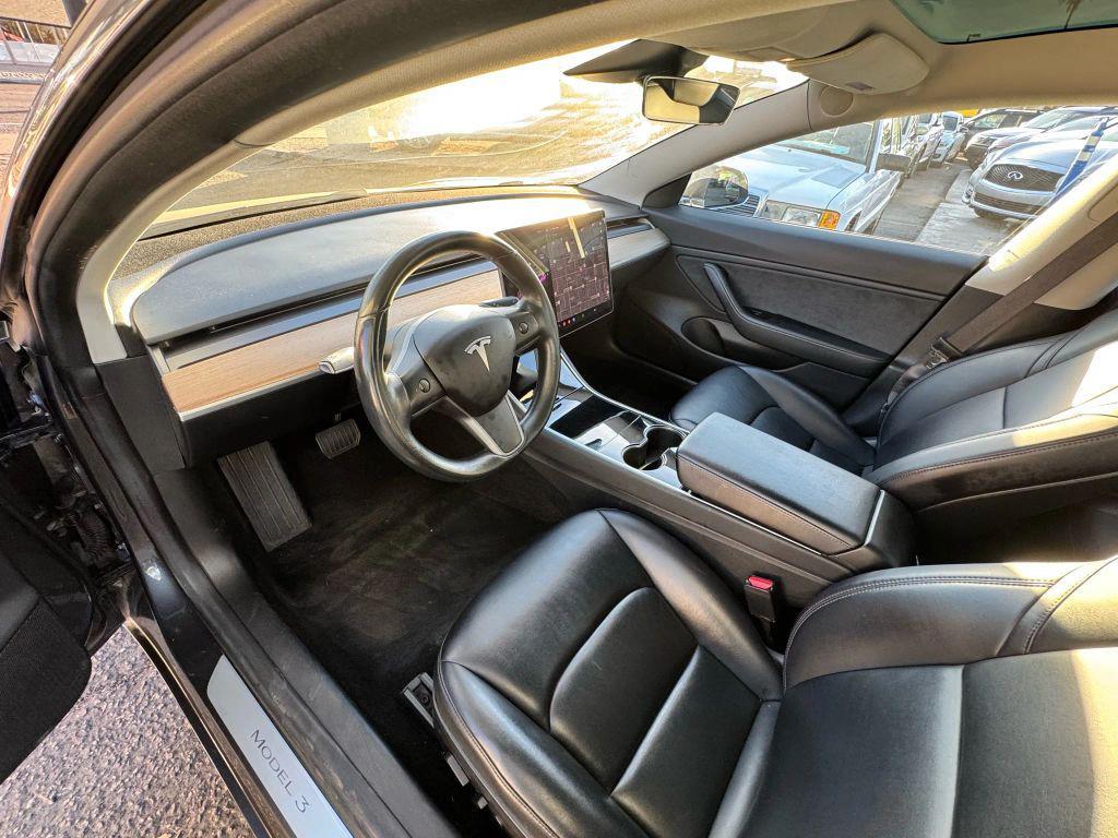 used 2018 Tesla Model 3 car, priced at $15,000