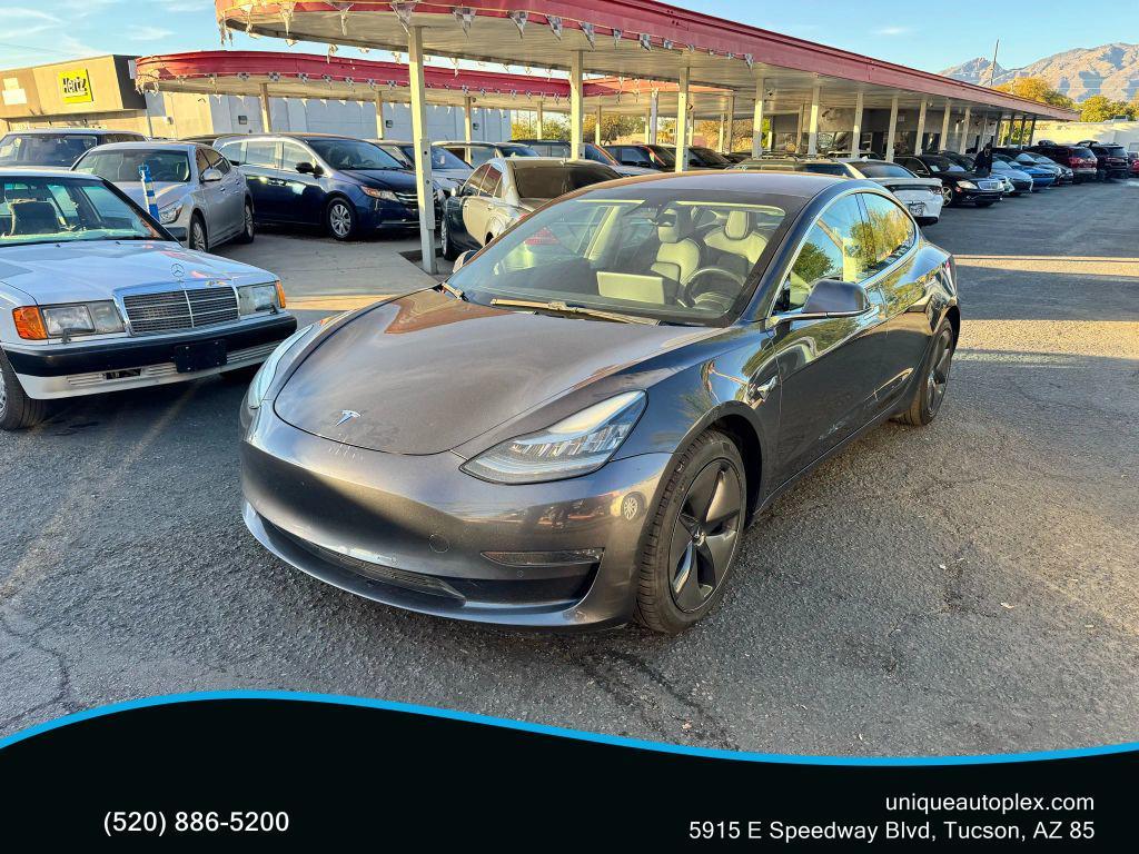 used 2018 Tesla Model 3 car, priced at $15,000