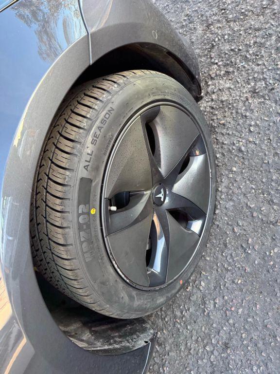 used 2018 Tesla Model 3 car, priced at $15,000