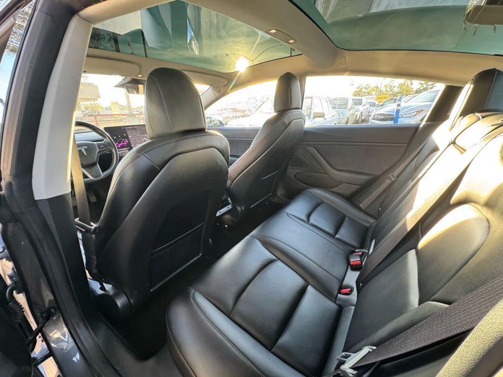 used 2018 Tesla Model 3 car, priced at $15,000