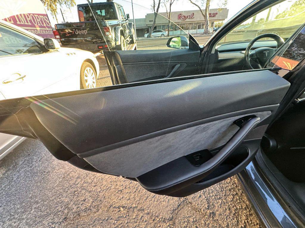 used 2018 Tesla Model 3 car, priced at $15,000