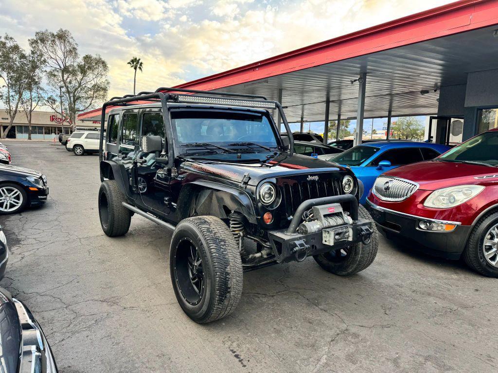used 2011 Jeep Wrangler Unlimited car, priced at $12,000