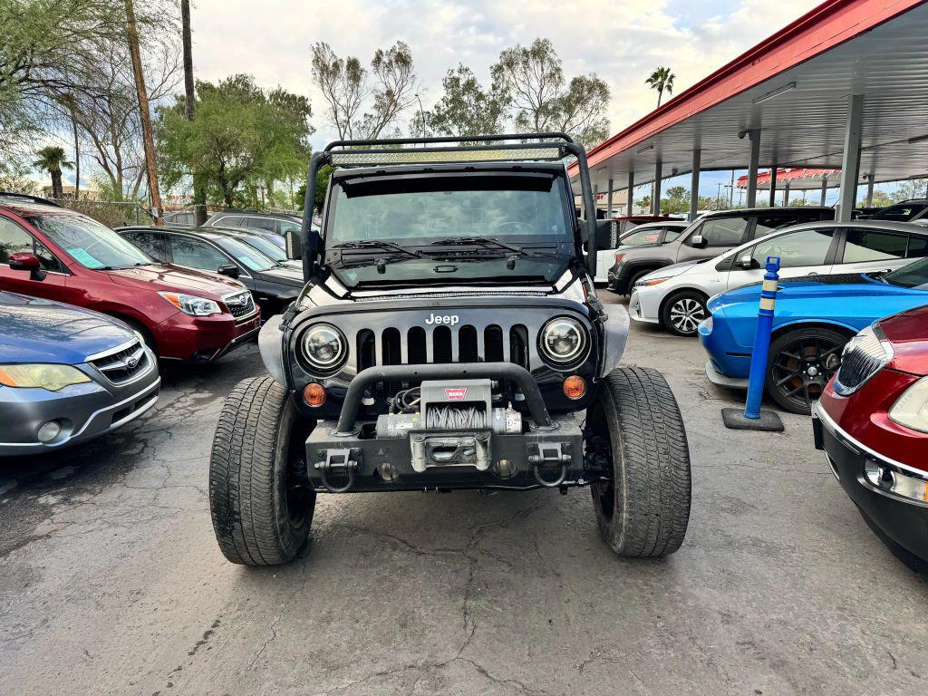 used 2011 Jeep Wrangler Unlimited car, priced at $12,000