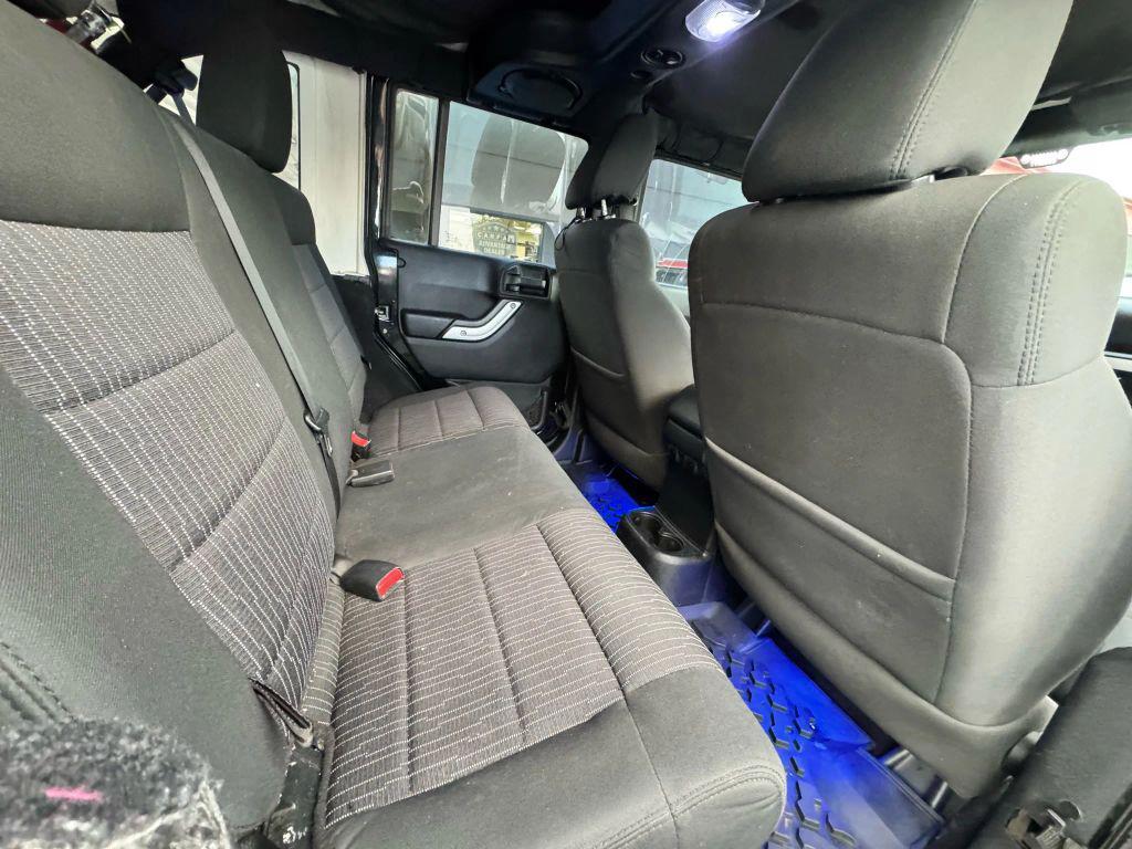 used 2011 Jeep Wrangler Unlimited car, priced at $12,000