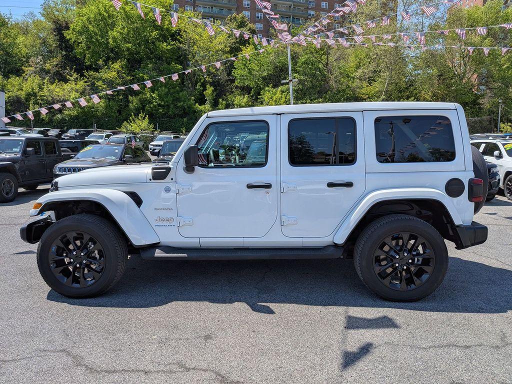 used 2023 Jeep Wrangler 4xe car, priced at $32,174