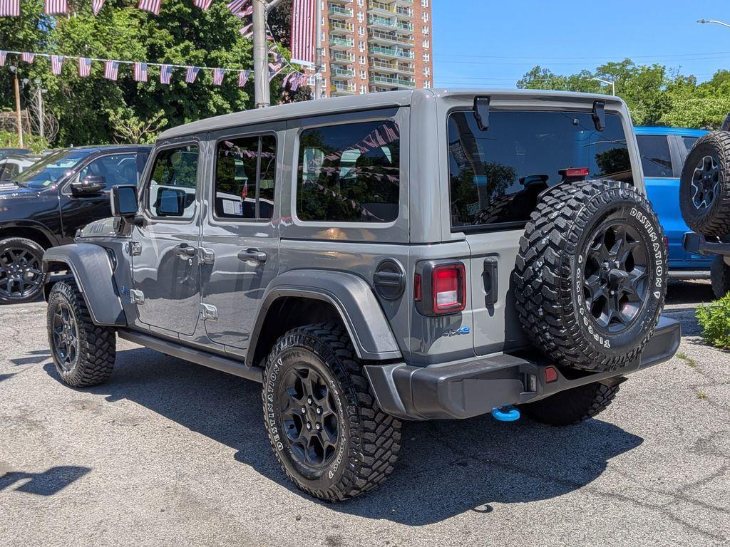 used 2023 Jeep Wrangler 4xe car, priced at $34,174