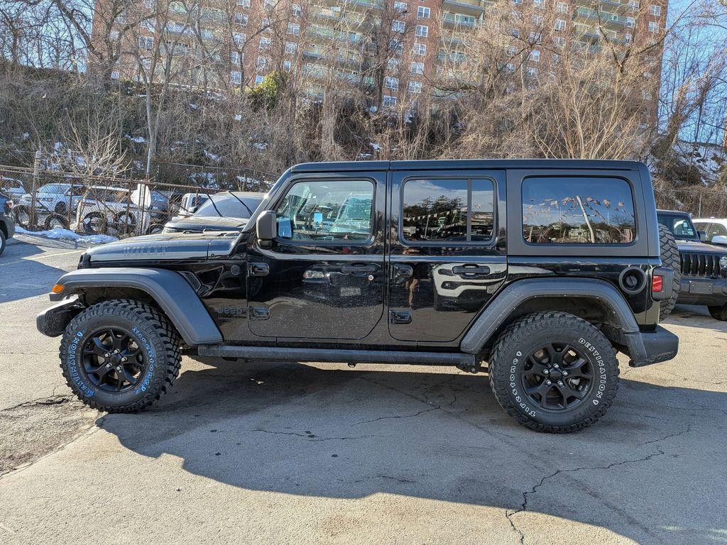 used 2021 Jeep Wrangler Unlimited car, priced at $27,999