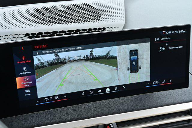 used 2024 BMW iX car, priced at $59,899