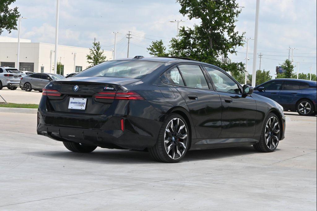 used 2024 BMW i5 car, priced at $70,213