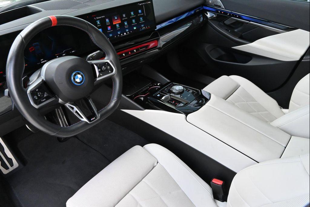 used 2024 BMW i5 car, priced at $70,213
