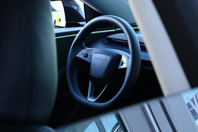 used 2025 Tesla Model 3 car, priced at $38,988