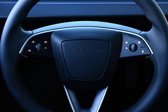 used 2025 Tesla Model 3 car, priced at $38,988