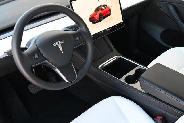 used 2025 Tesla Model Y car, priced at $40,588