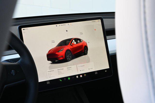 used 2025 Tesla Model Y car, priced at $40,588