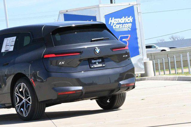 new 2026 BMW iX car, priced at $96,550