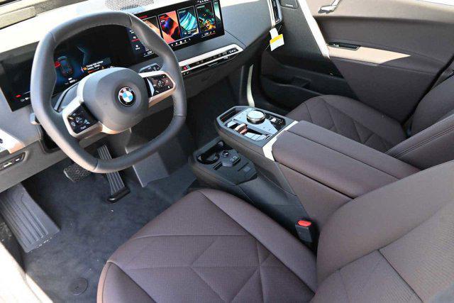 new 2026 BMW iX car, priced at $96,550