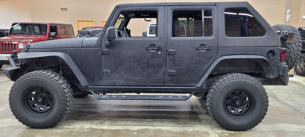 used 2009 Jeep Wrangler Unlimited car, priced at $22,599