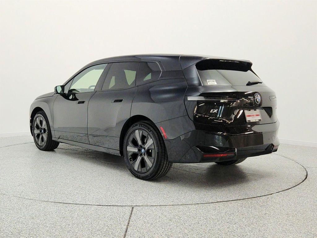 used 2025 BMW iX car, priced at $59,894