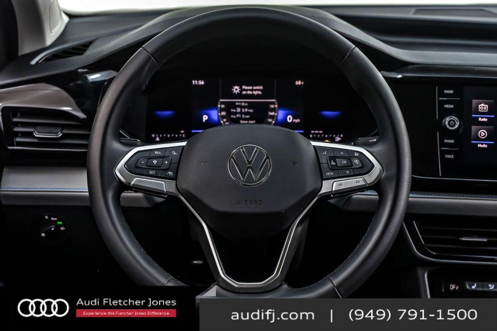 used 2024 Volkswagen Taos car, priced at $23,393