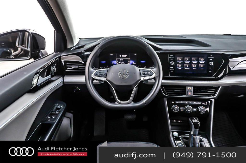 used 2024 Volkswagen Taos car, priced at $23,393