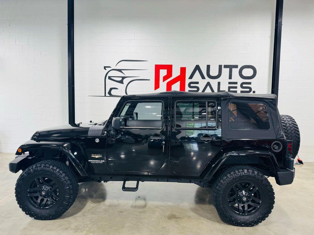 used 2012 Jeep Wrangler Unlimited car, priced at $18,450