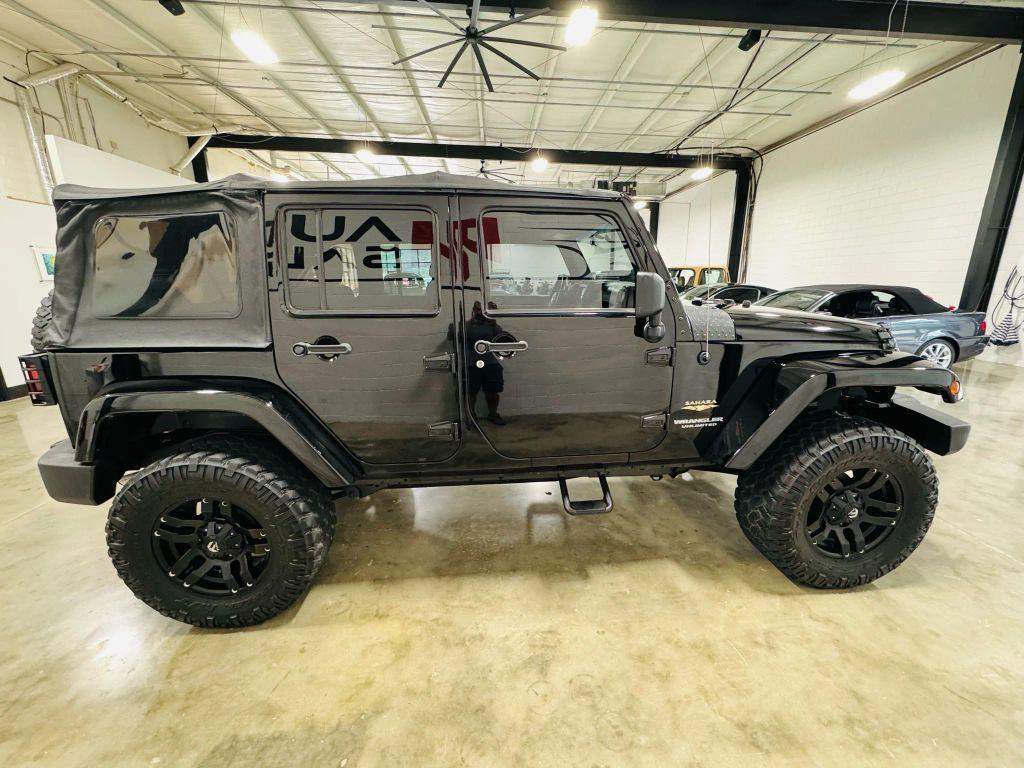 used 2012 Jeep Wrangler Unlimited car, priced at $18,450