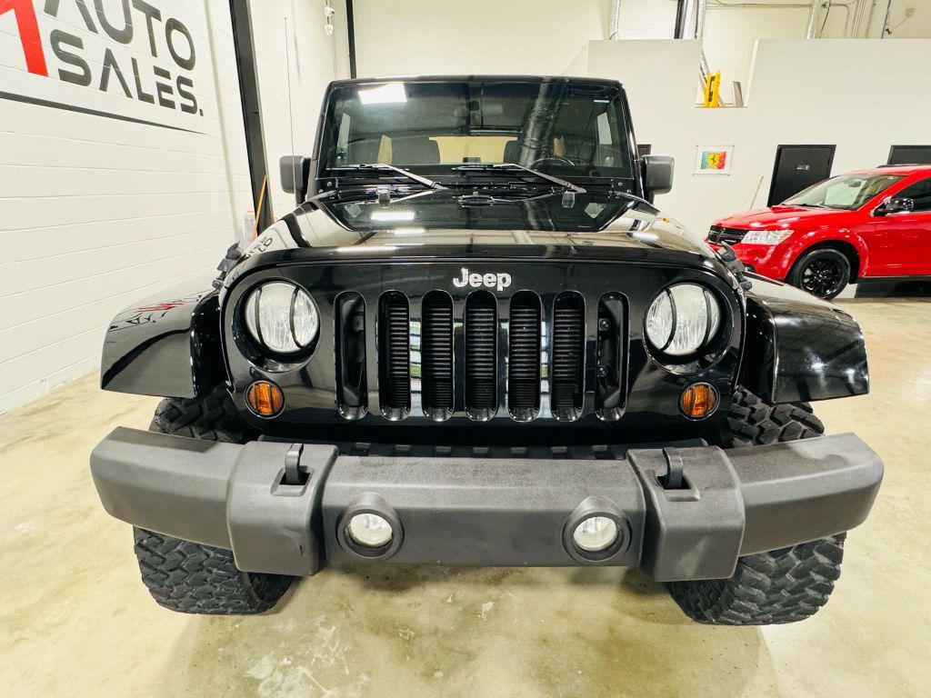 used 2012 Jeep Wrangler Unlimited car, priced at $18,450