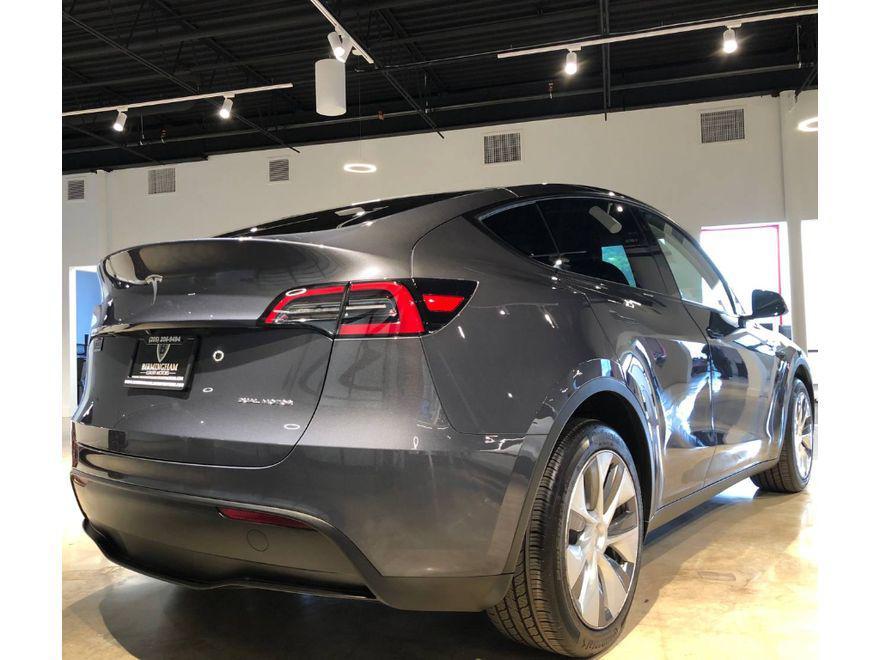 used 2023 Tesla Model Y car, priced at $25,999