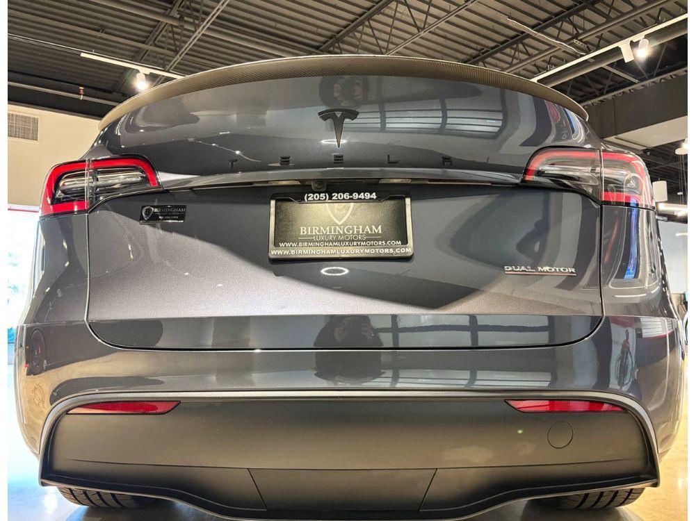 used 2023 Tesla Model Y car, priced at $29,999