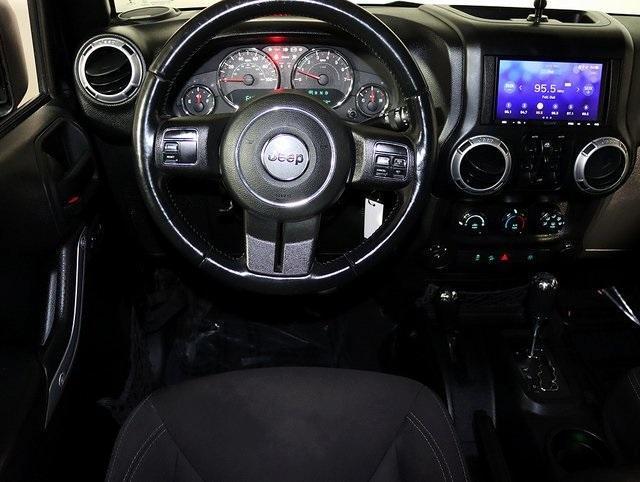 used 2015 Jeep Wrangler Unlimited car, priced at $15,049