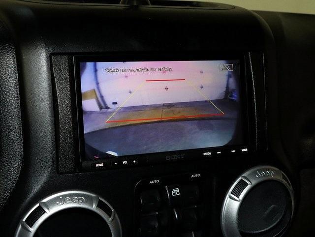 used 2015 Jeep Wrangler Unlimited car, priced at $15,049