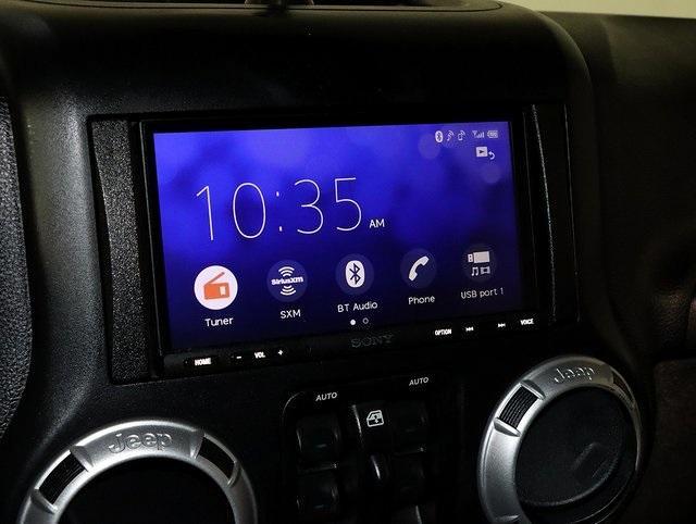 used 2015 Jeep Wrangler Unlimited car, priced at $15,049