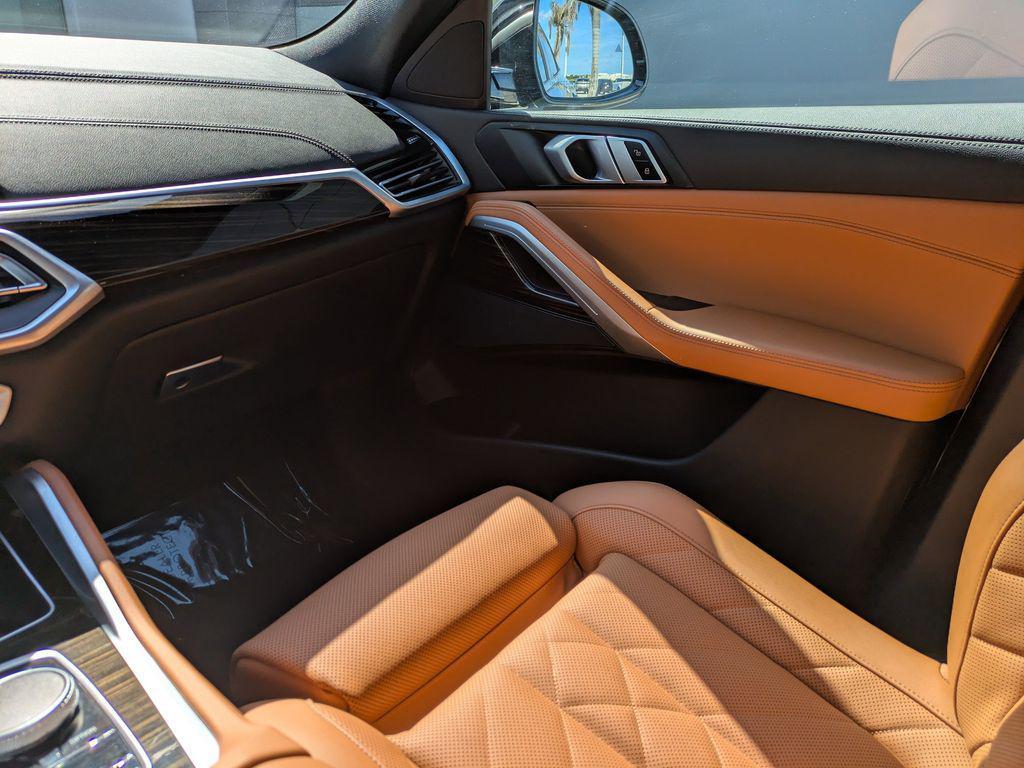 used 2023 BMW X6 car, priced at $52,499