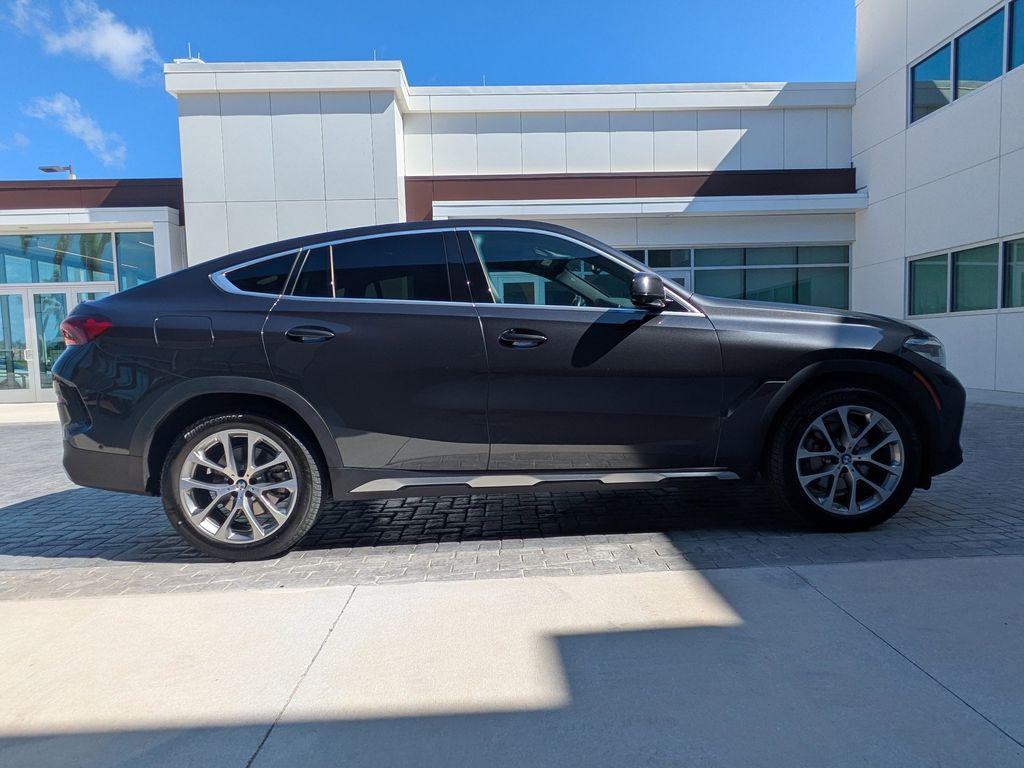 used 2023 BMW X6 car, priced at $52,499